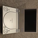 Audiovox D1708pk Portable 7" Lcd Dvd Player Mp3 Remote Headphones Bag Silver. Fixed Price $70.00.