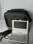 2005 Polaroid Pdm-0722 Portable 7in Lcd Dvd/cd Player Silver Region 1 W/ Case. Fixed Price $45.00.