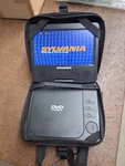 Sylvania Sdvd7040b Portable Dvd Player 7 Screen Working With Headrest Hanger. Fixed Price $39.99.